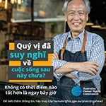 Vietnamese man with apron on, smiling