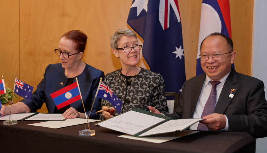 Commission President Emeritus Professor Rosalind Croucher AM, Australia’s Ambassador for Human Rights Brontë Moules and Phoukhong Sisoulath, Director General of the Department of Treaty and Law within the Lao Ministry of Foreign Affairs signing the memorandum of understanding.