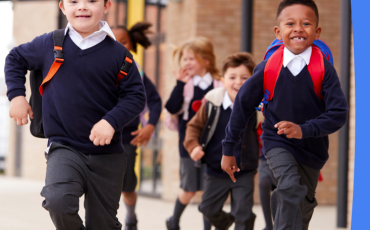 Report cover with an image of children running. Title reads 'Safeguarding Children: Using a child rights impact assessment to improve our laws and policies' 
