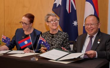 Commission President Emeritus Professor Rosalind Croucher AM, Australia’s Ambassador for Human Rights Brontë Moules and Phoukhong Sisoulath, Director General of the Department of Treaty and Law within the Lao Ministry of Foreign Affairs signing the memorandum of understanding.