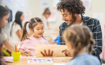 a man looking after kids in a childcare centre